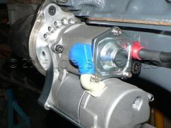 High torque starter secured to bell-housing