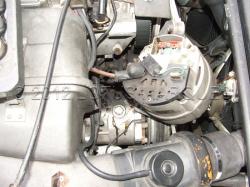 Alternator with voltage regulator removed
